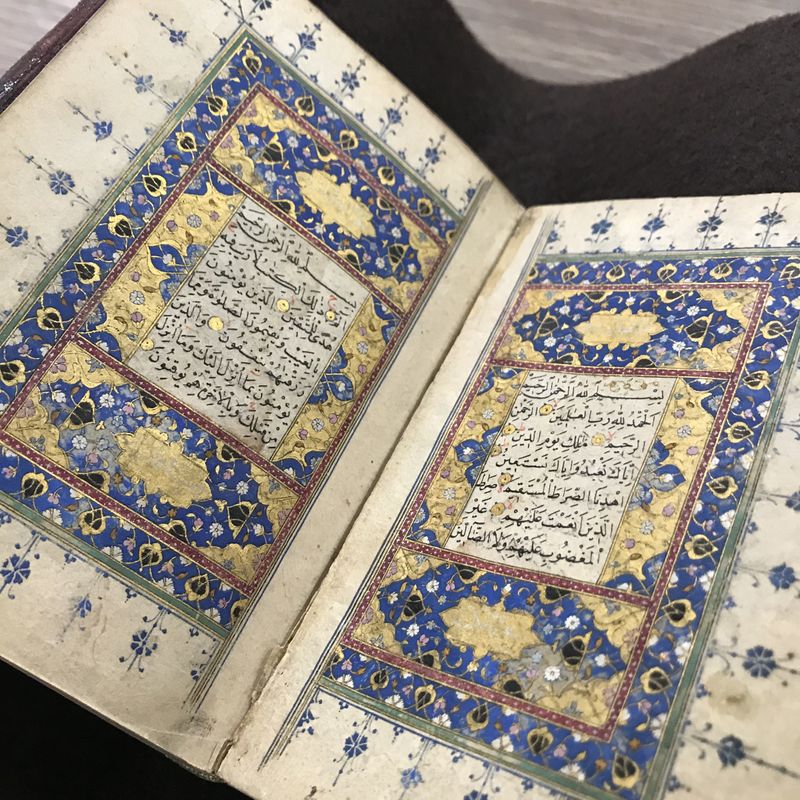 Pocket-sized copy of the Qur’ān, illuminated opening