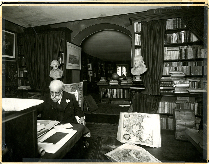 [Photo of Henry Vignaud in his library]